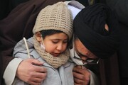 گریه دختر خردسال خلبان شهید فلاحی در مراسم تشییع پدر + فیلم