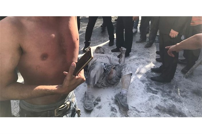  مرد میانسال خود را مقابل شهرداری تهران  به آتش  کشید+عکس